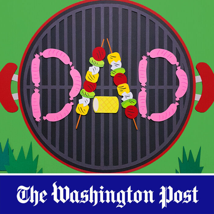 A papercraft collage illustration featuring a barbeque in a grassy backyard, with barbeque meats and vegetables laid out to spell the word “Dad”